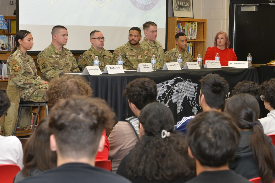 Cyber outreach panel discussing cybersecurity careers with middle school students